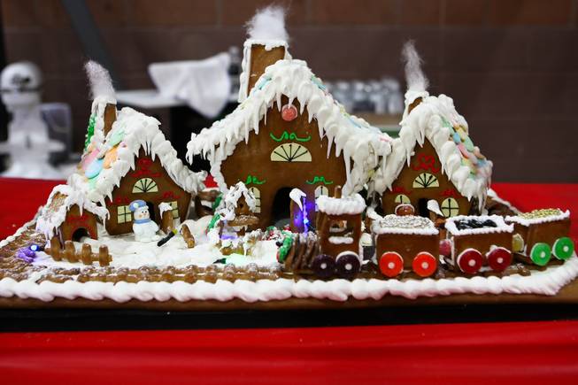 Gingerbread houses made by Chef Jesus Castillo, of MGM/Monte Carlo Resort and Casino, are on display during the "We Knead the Dough" at Faith Lutheran School campus Saturday, December 8, 2012.